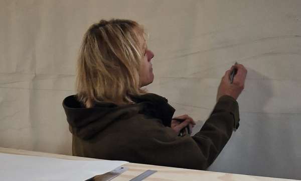 Kate Hanrahan Kate Hanrahan will be carving the timber benches and timber retaining wall for the Octavia Hill Garden