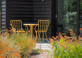 Yellow coffee table in contemporary courtyard - Contemporary Rural Courtyard designed by Ann- Marie Powell, Hampshire, UK, June 2009